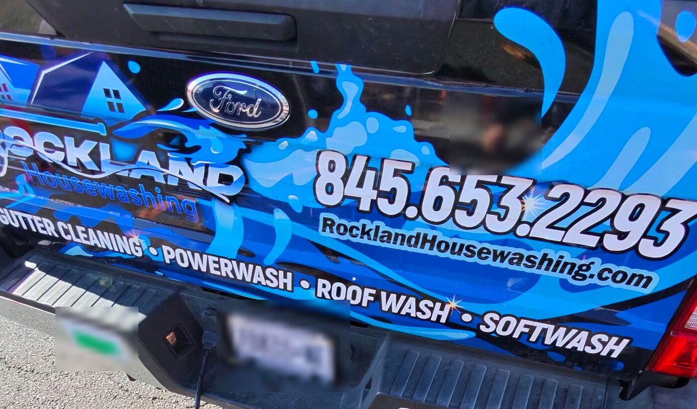 The Rockland Housewashing truck with our phone number on the tailgate